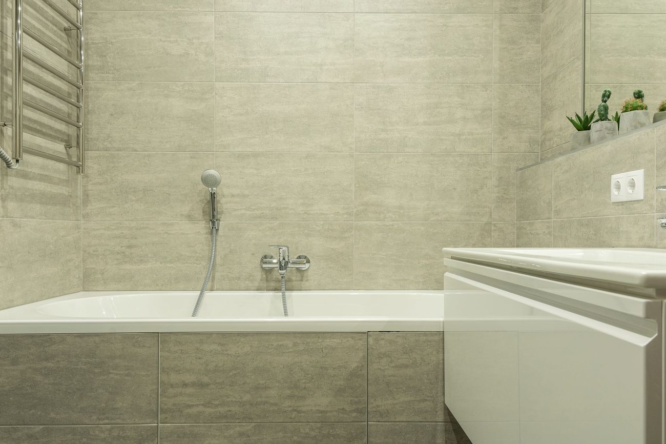 Re-grouting and re-sealing the bath for £19