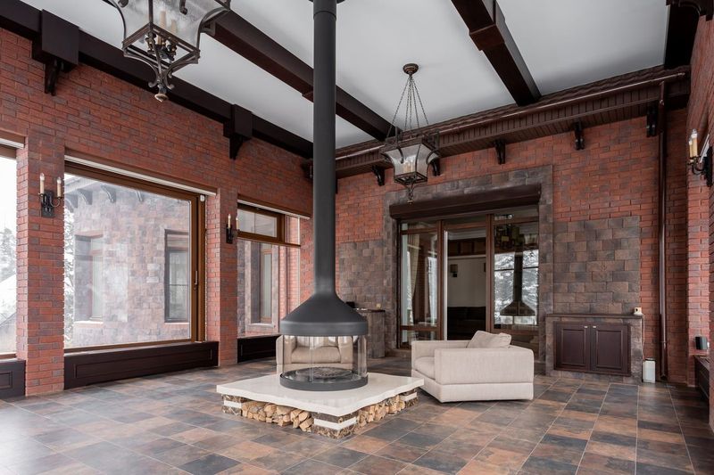 Uncovering a 1930s tiled fireplace behind a sheet of hardboard